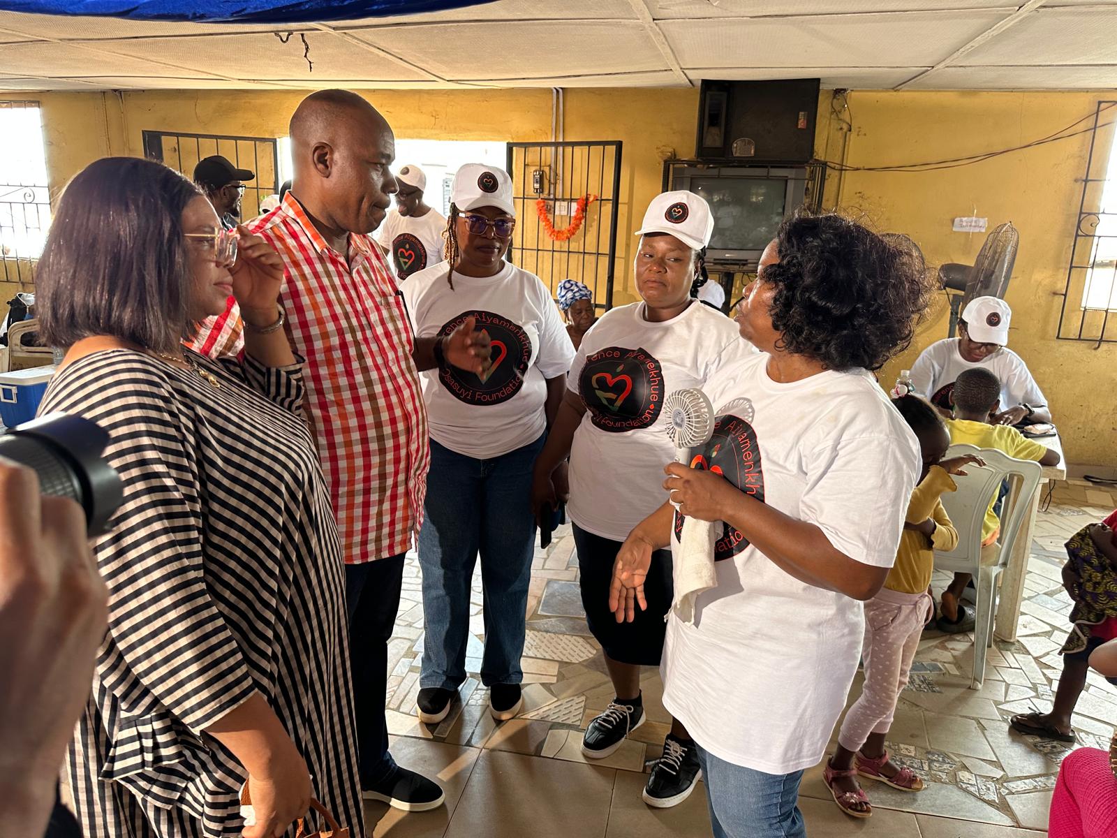 LAOF team members welcoming visitors at an outreach venue