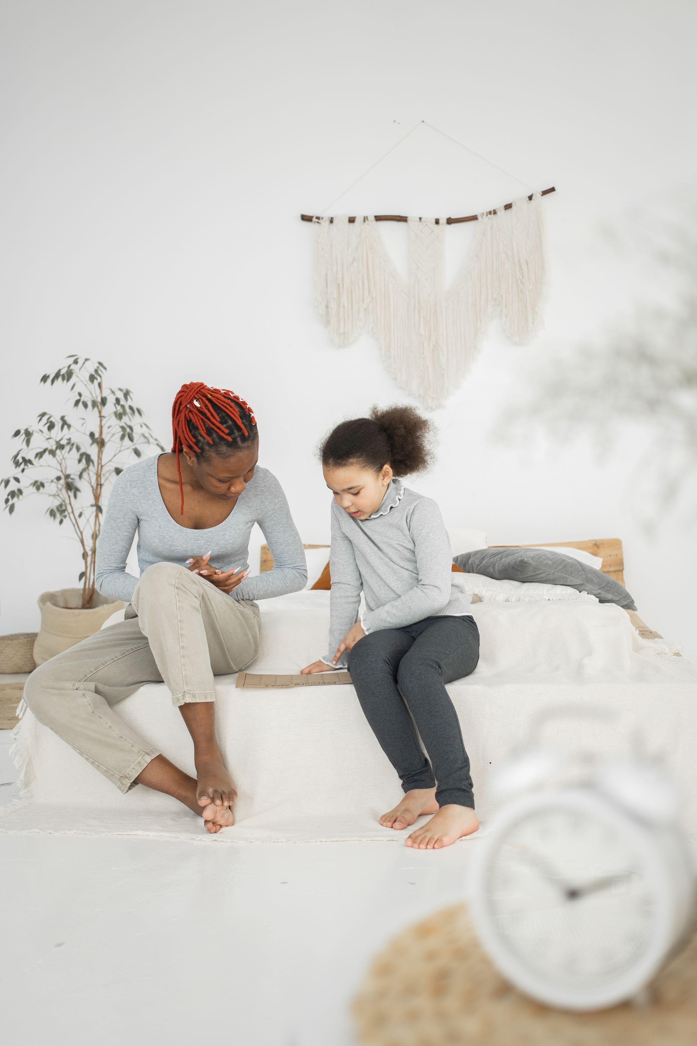 Illustrative photo: A mother and child reading together at home