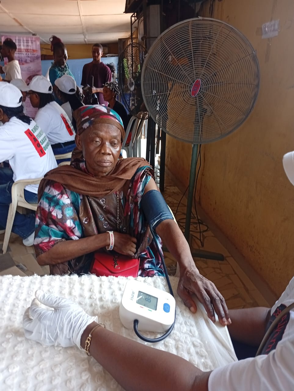 A participant having her blood pressure checked at a LAOF outreach