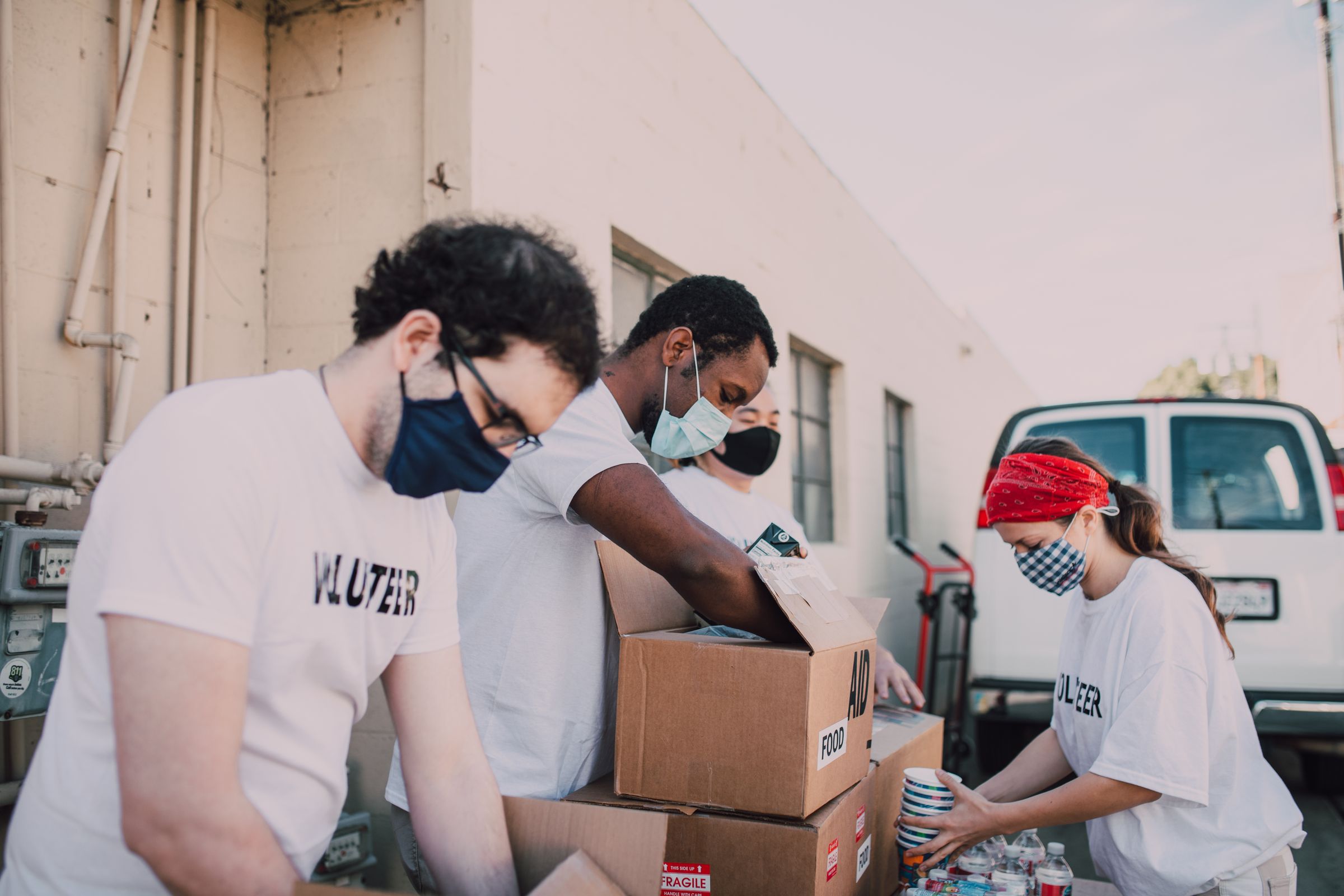 Illustrative photo: A team organising donated food outdoors