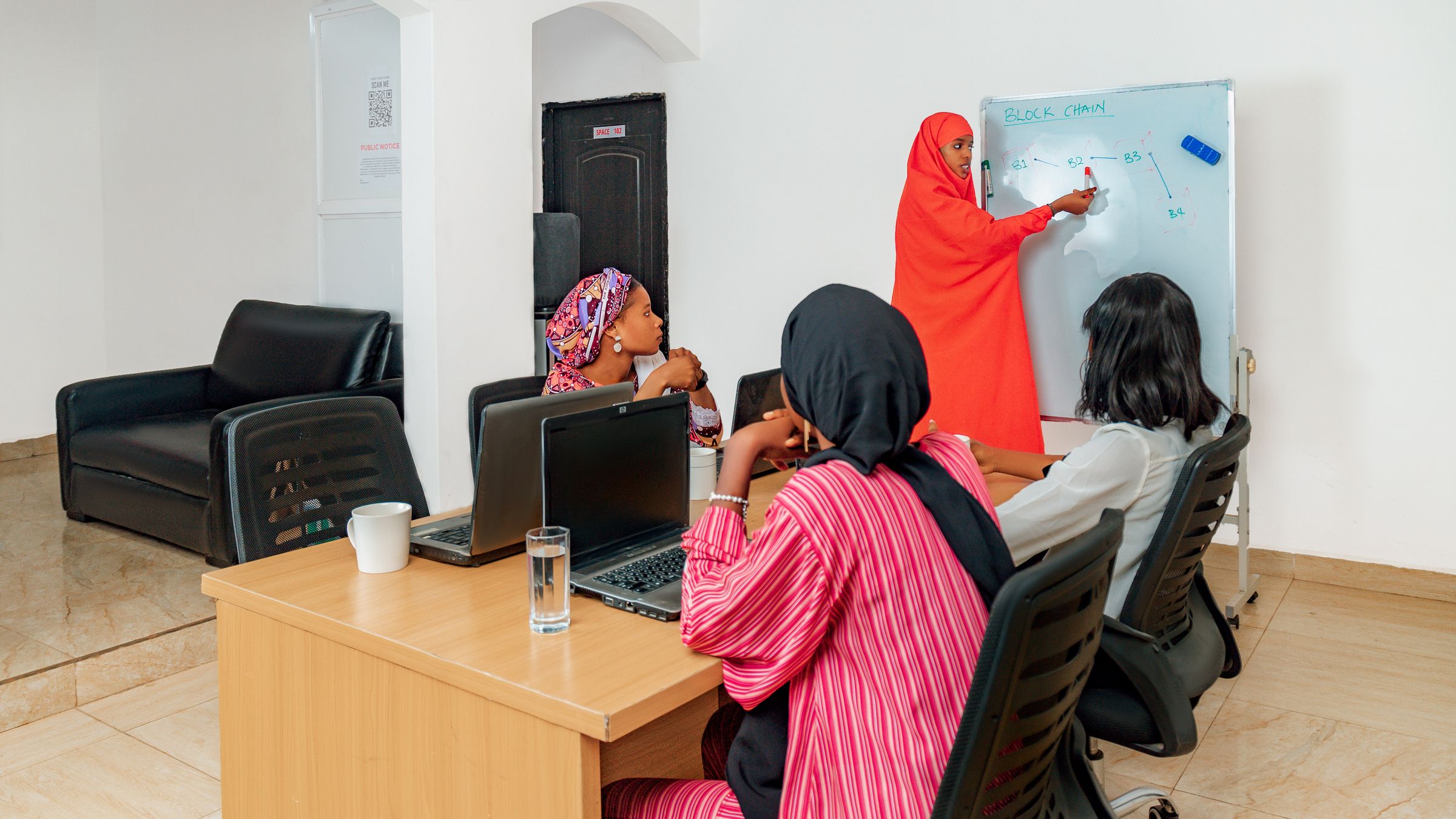 Illustrative photo: Women taking part in a technology workshop
