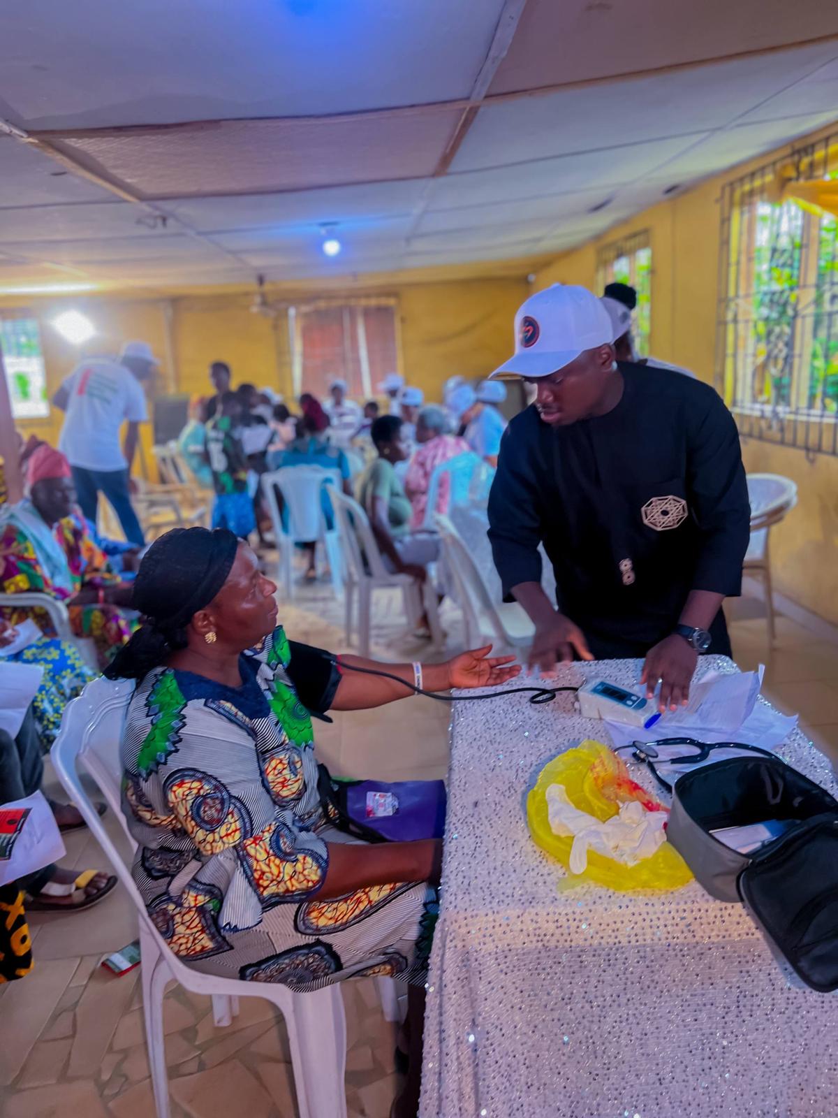 A LAOF representative meeting participants at a community event