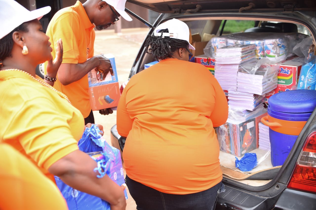 LAOF volunteers unloading supplies from a vehicle