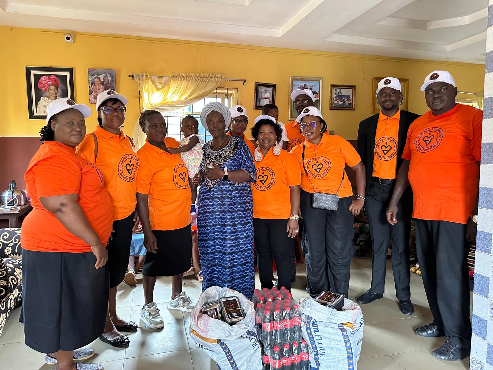 LAOF volunteers and community hosts gathered around supplies