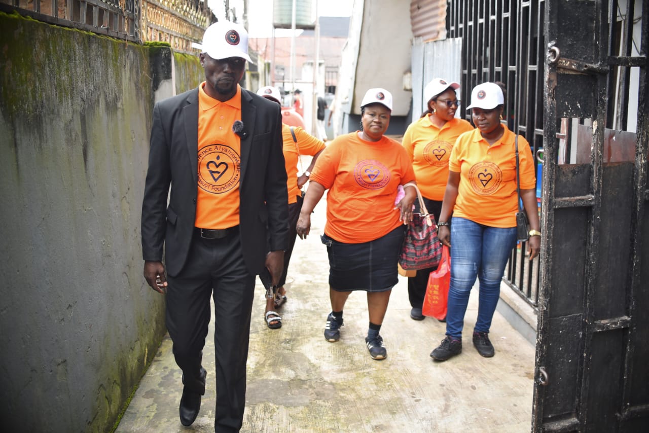 LAOF volunteers walking together towards a community venue