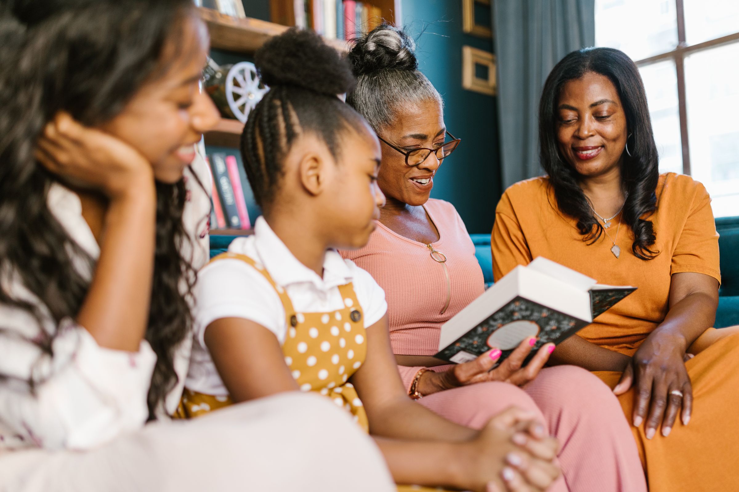 Illustrative photo: A family enjoying a book together at home