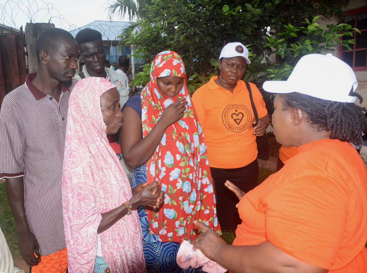 LAOF volunteers talking with community members outdoors