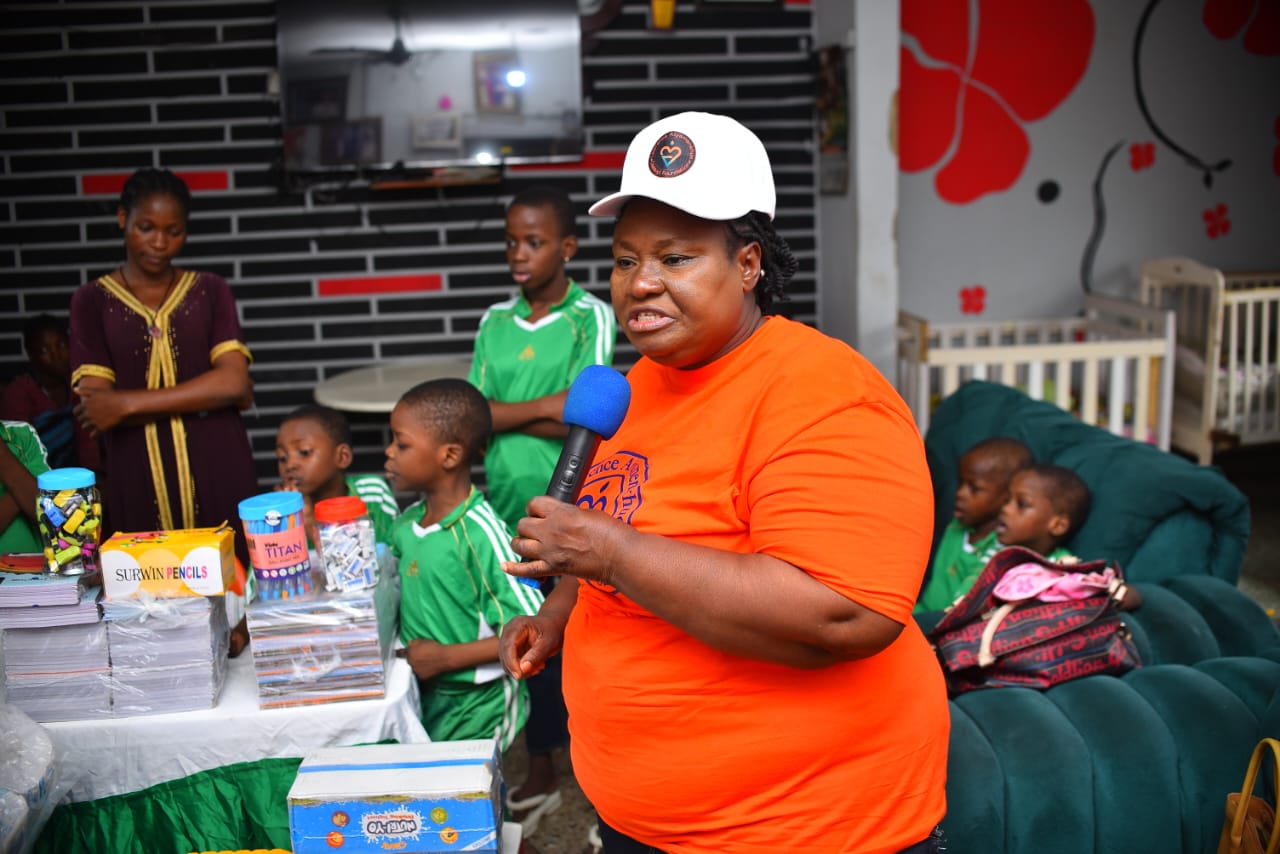 A volunteer holding a microphone during a LAOF visit