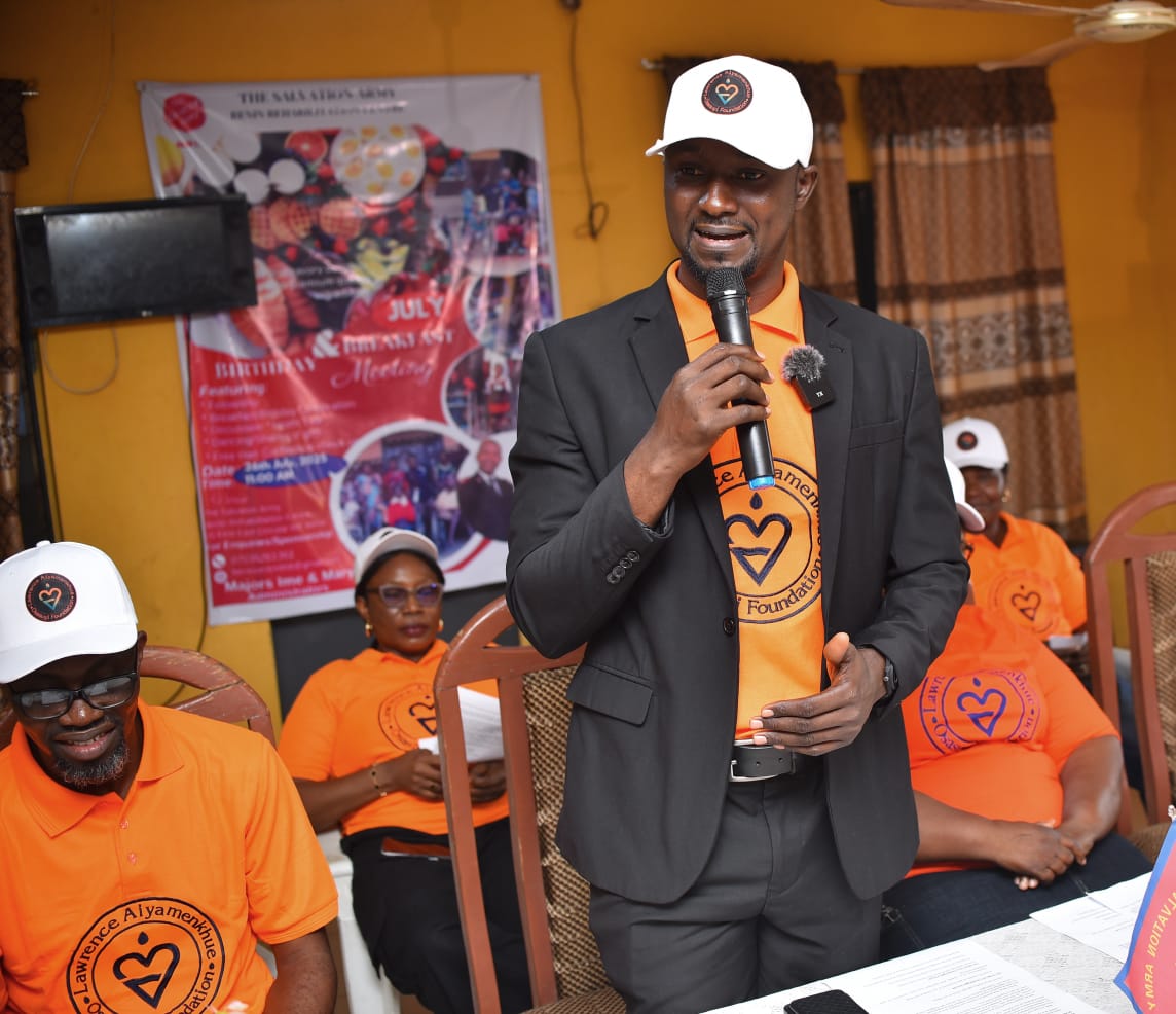 A LAOF representative speaking into a microphone at a community event