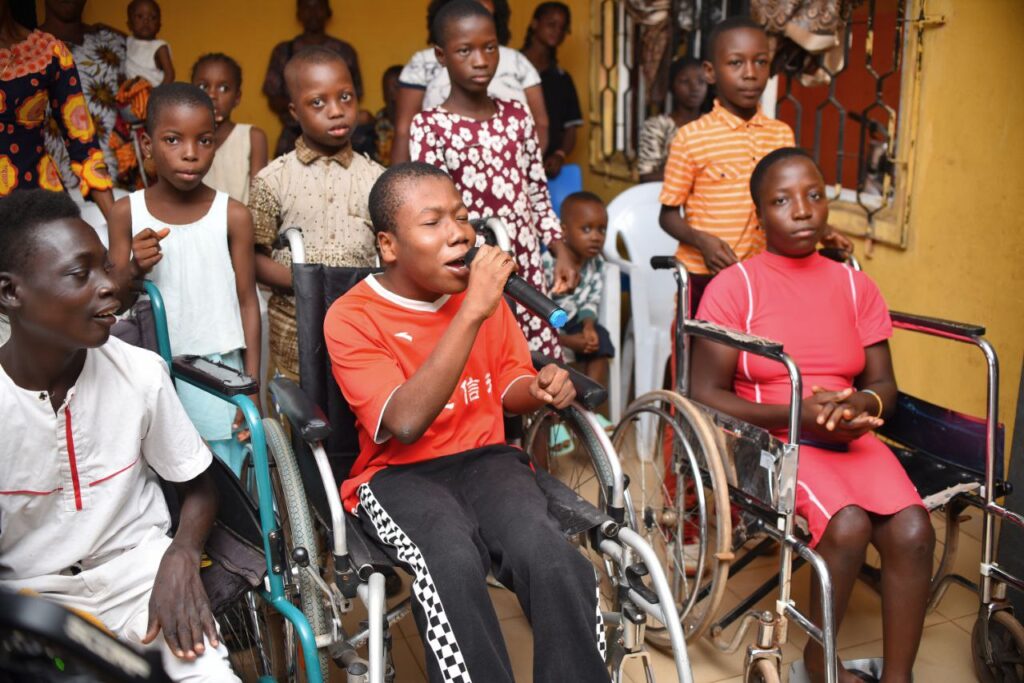 Children walking and playing round the table with joy and happiness
