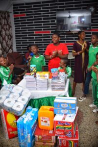 Children standing with heart filled with joy